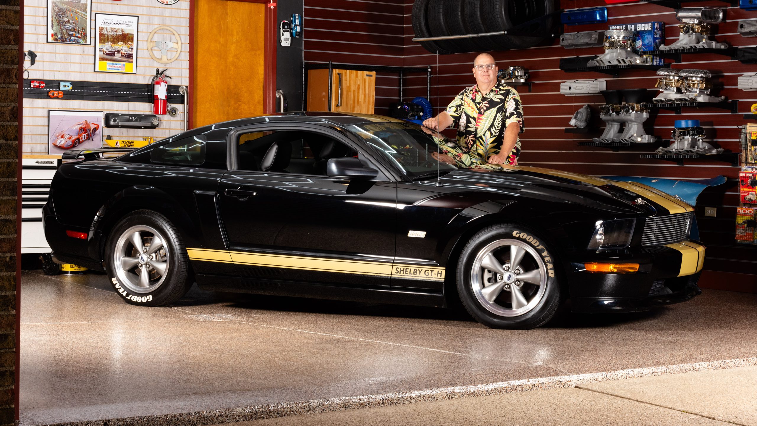 Passion portrait — collector with his Shelby GT-H Mustang in a vintage garage, Ann Arbor