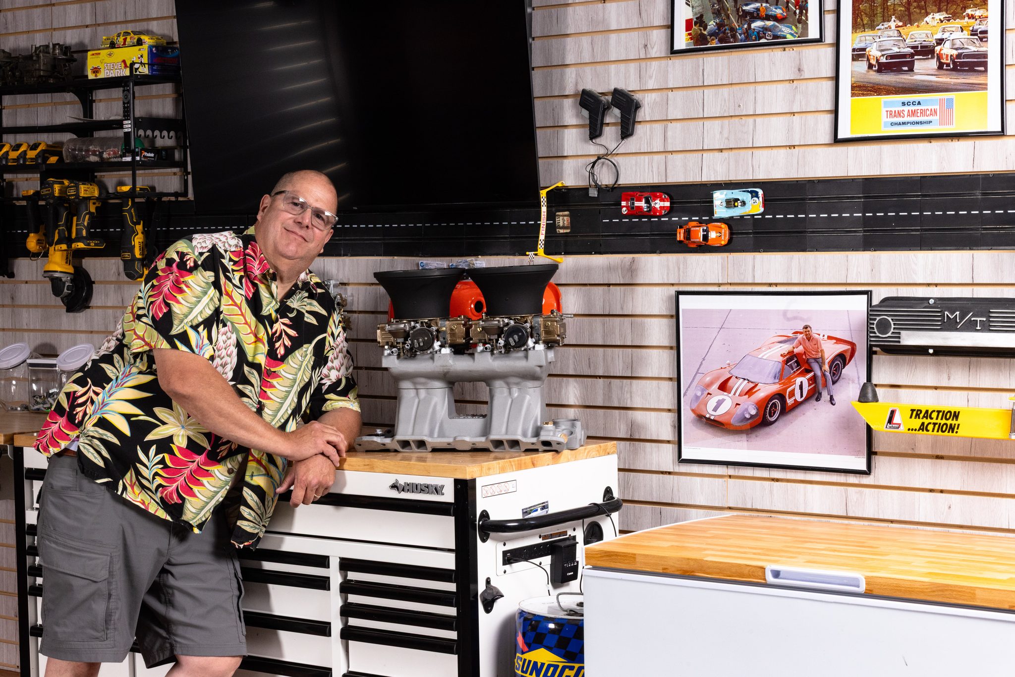 Fine art passion portrait with a classic engine intake and slot car track display — Ann Arbor portrait photography